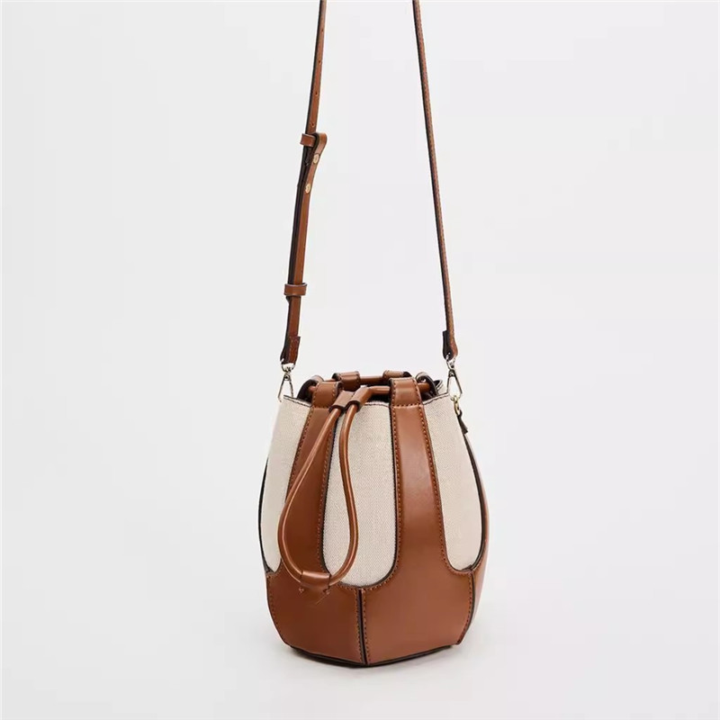 Damen Umhängetasche im Bucket-Stil ⎜ Modische Canvas-Tasche mit Kordelzug und verstellbarem Schulterriemen