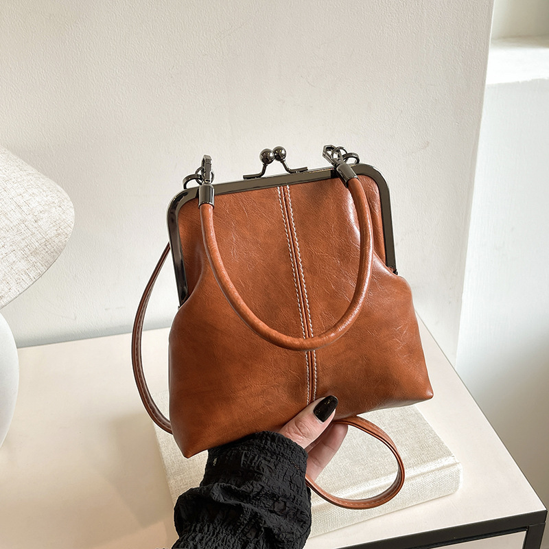 Damen Handtasche im Vintage-Look ⎜ Elegante Umhängetasche mit Bügelverschluss und Kompakter Schalenform