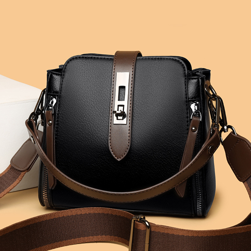 Umhängetasche für Damen ⎜ Geräumige Schultertasche in Lederoptik mit breitem Riemen und Schnallenverschluss