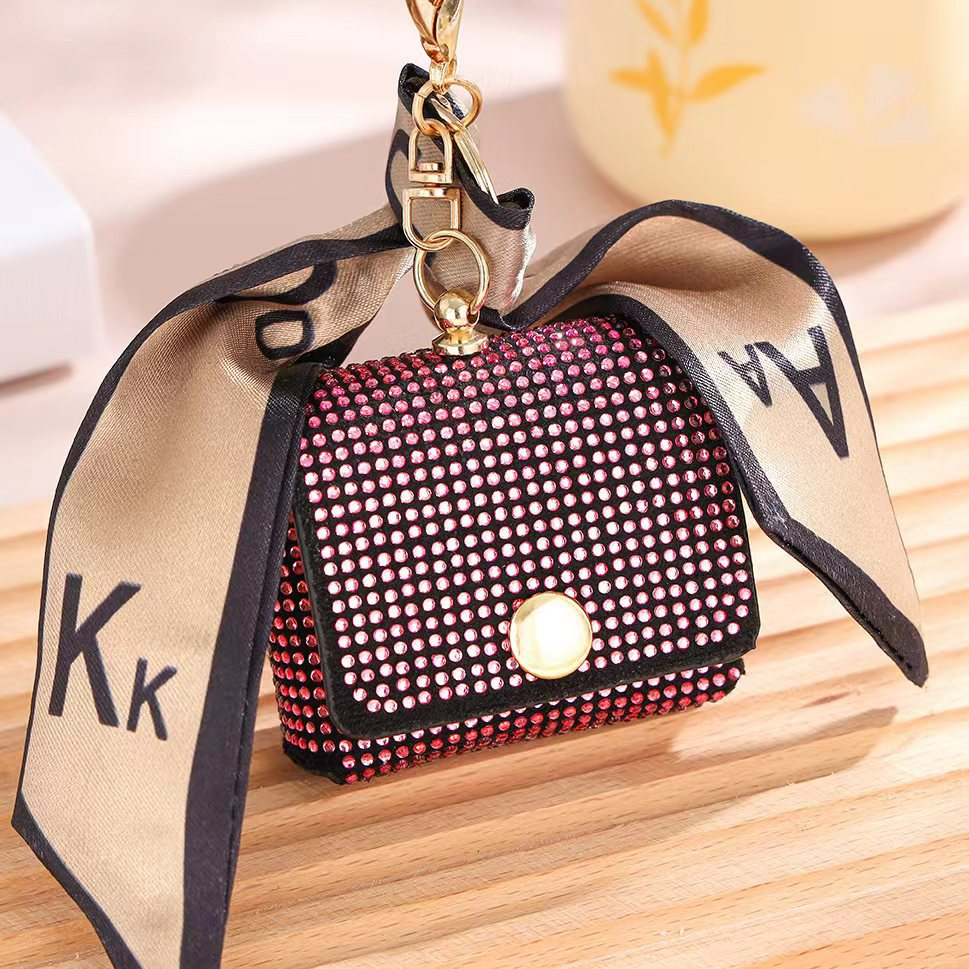 Damen Mini-Münzbörse mit Glitzersteinen ⎜ Stilvolle Tasche mit Schlüsselanhänger und dekorativem Band für unterwegs