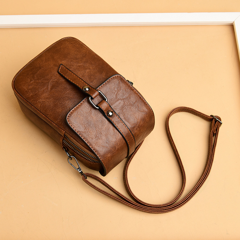 Crossbody Umhängetasche für Damen ⎜ Kompakte Schultertasche mit Handyfach und modernem Patchwork-Design