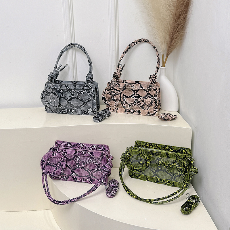 Umhängetasche für Damen ⎜ Stylische Crossbody-Tasche mit Schlangenmuster und transparentem Design-Element