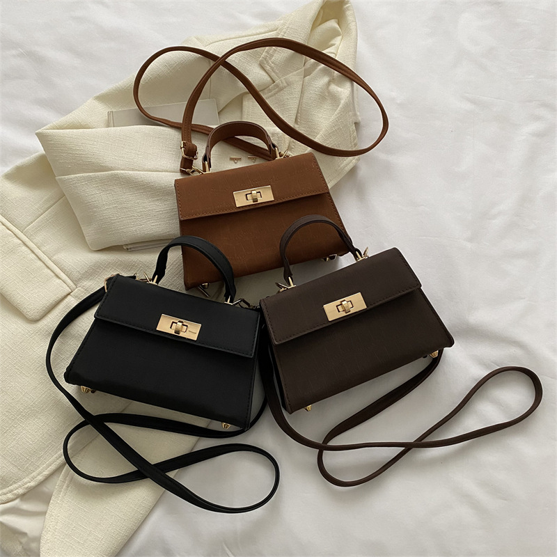 Umhängetasche für Damen ⎜ Klassische Mini-Handtasche mit Drehverschluss und Tragegriff für stilvolle Outfits