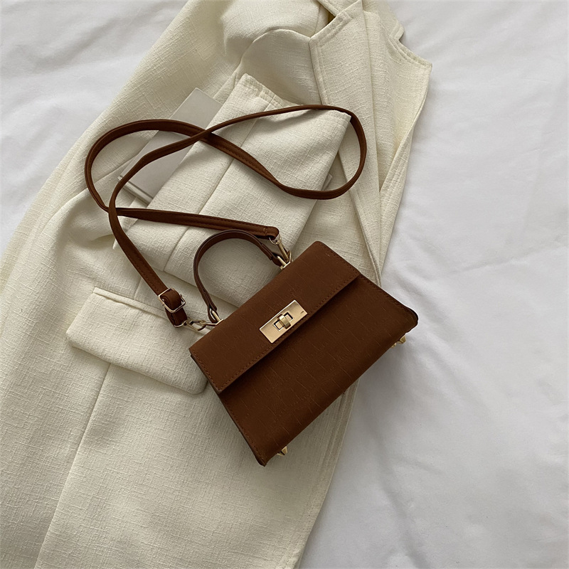 Umhängetasche für Damen ⎜ Klassische Mini-Handtasche mit Drehverschluss und Tragegriff für stilvolle Outfits