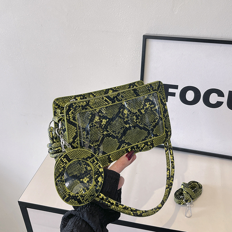 Umhängetasche für Damen ⎜ Stylische Crossbody-Tasche mit Schlangenmuster und transparentem Design-Element