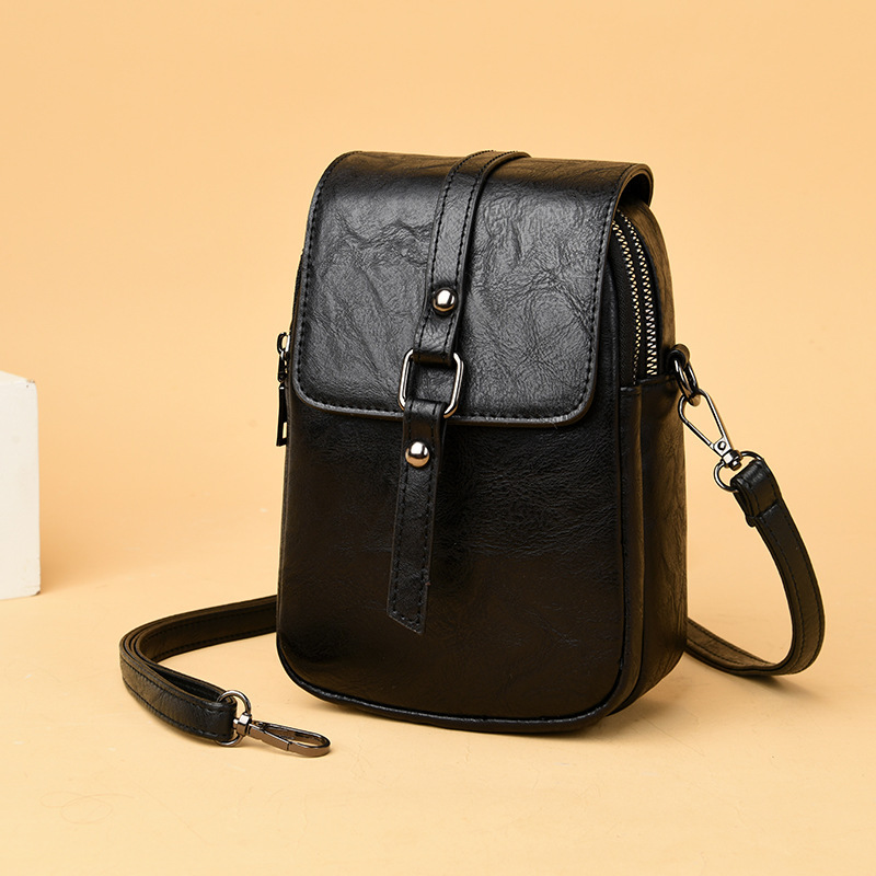 Crossbody Umhängetasche für Damen ⎜ Kompakte Schultertasche mit Handyfach und modernem Patchwork-Design
