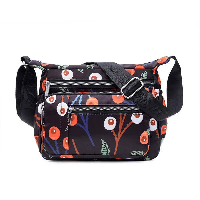 Umhängetasche für Damen ⎜ Leichte Schultertasche aus Nylon mit buntem Print und mehreren Reißverschlussfächern