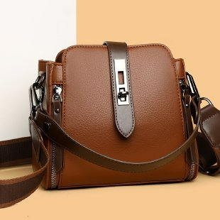 Umhängetasche für Damen ⎜ Geräumige Schultertasche in Lederoptik mit breitem Riemen und Schnallenverschluss