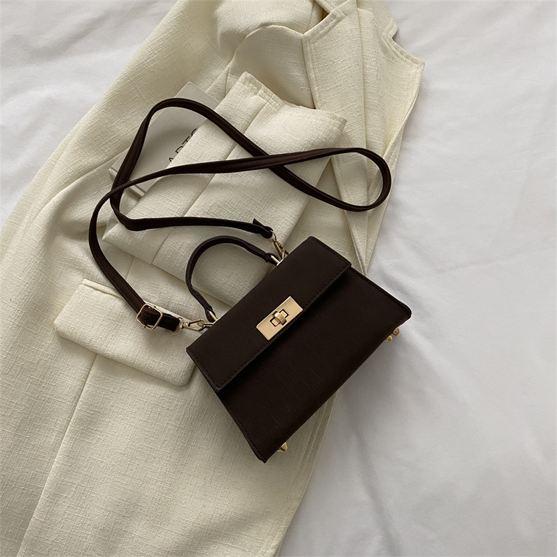 Umhängetasche für Damen ⎜ Klassische Mini-Handtasche mit Drehverschluss und Tragegriff für stilvolle Outfits