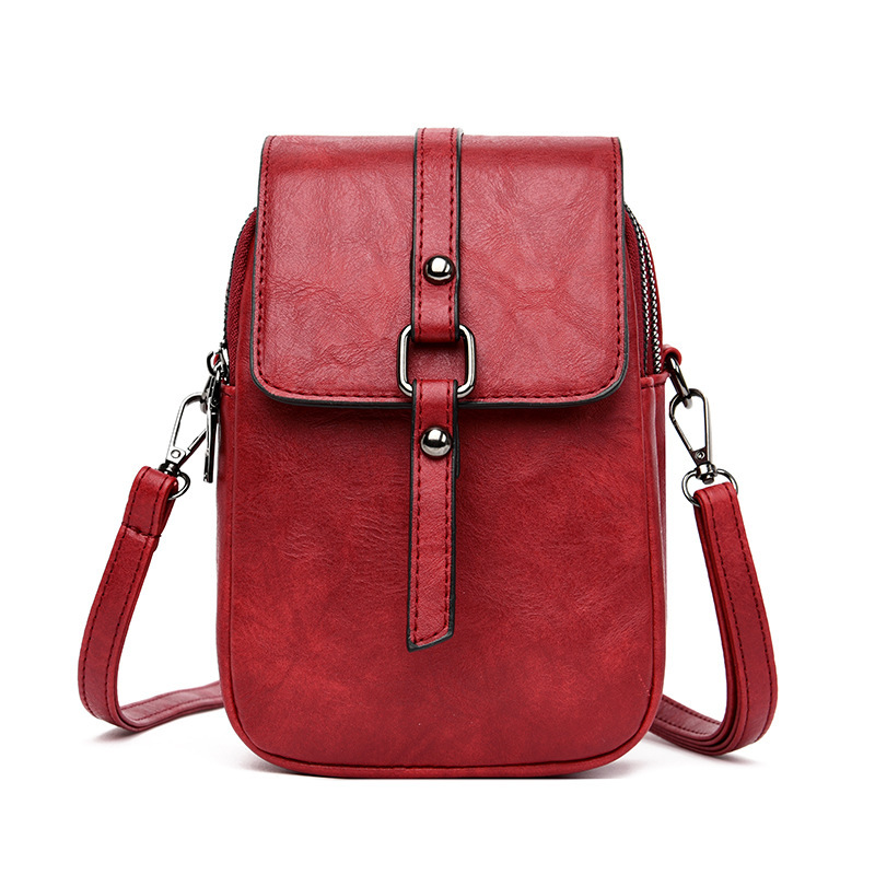 Crossbody Umhängetasche für Damen ⎜ Kompakte Schultertasche mit Handyfach und modernem Patchwork-Design