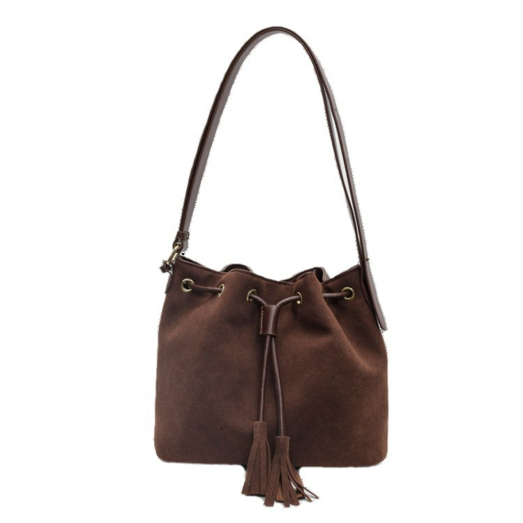 Beuteltasche für Damen ⎜ Modische Umhängetasche aus Wildlederimitat mit Kordelzug und Quasten für den Alltag