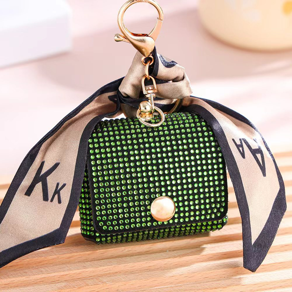 Damen Mini-Münzbörse mit Glitzersteinen ⎜ Stilvolle Tasche mit Schlüsselanhänger und dekorativem Band für unterwegs