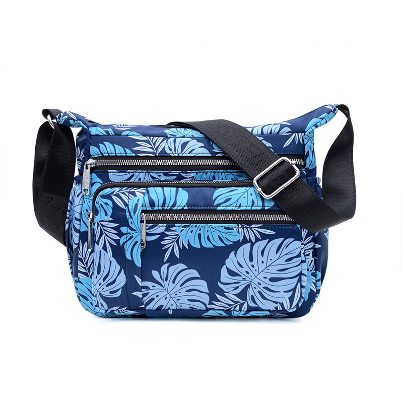 Umhängetasche für Damen ⎜ Leichte Schultertasche aus Nylon mit buntem Print und mehreren Reißverschlussfächern