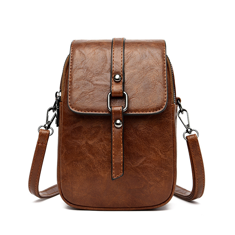 Crossbody Umhängetasche für Damen ⎜ Kompakte Schultertasche mit Handyfach und modernem Patchwork-Design