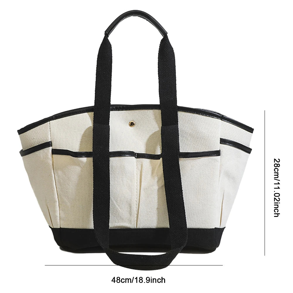 Wickeltasche für Eltern ⎜ Geräumige Tragetasche aus Canvas mit mehreren Fächern und praktischem Flaschenhalter