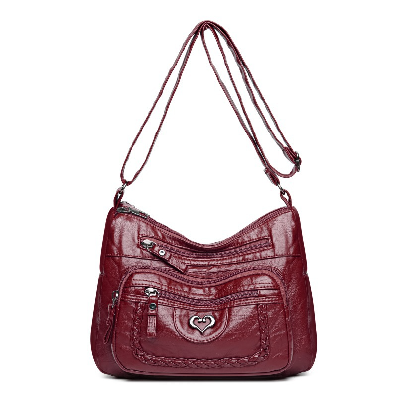 Schultertasche für Damen ⎜ Sommerliche Umhängetasche mit großem Stauraum und stilvollem Herzdetail vorne