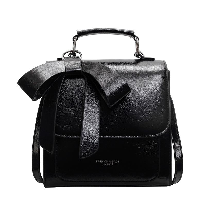 Moderne Umhängetasche für Damen ⎜ Elegante Tasche mit Schleifen-Design und praktischem Tragegriff