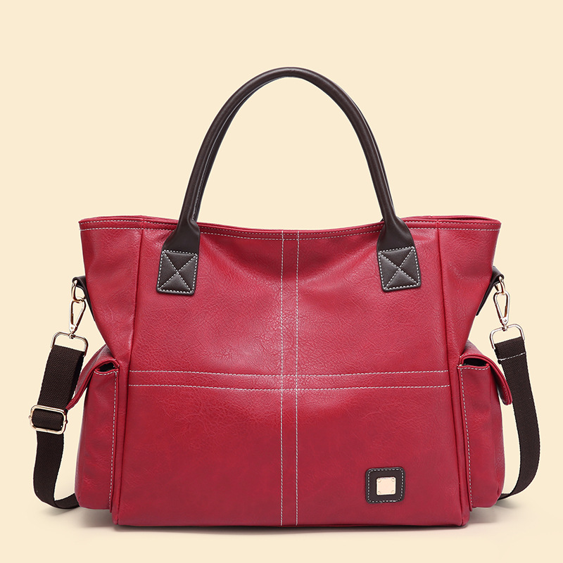 Handtasche für Damen ⎜ Geräumige Schultertasche in Lederoptik mit Seitenfächern und Tragegurt