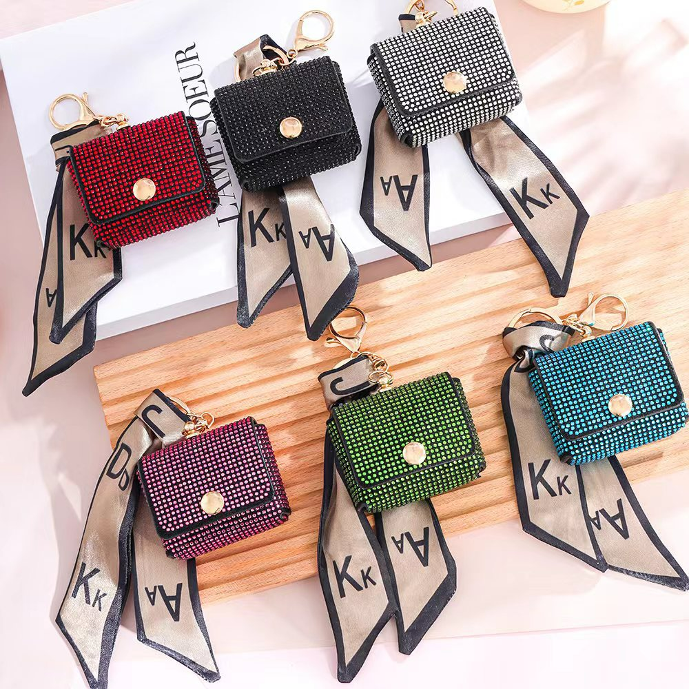 Damen Mini-Münzbörse mit Glitzersteinen ⎜ Stilvolle Tasche mit Schlüsselanhänger und dekorativem Band für unterwegs