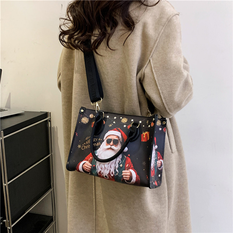 Handtasche für Damen ⎜ Weihnachtliche Tragetasche mit Santa-Print und breitem Riemen für festliche Outfits