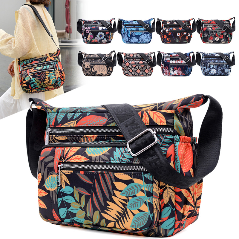 Umhängetasche für Damen ⎜ Leichte Schultertasche aus Nylon mit buntem Print und mehreren Reißverschlussfächern