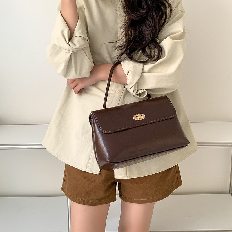 Handtasche für Damen ⎜ Elegante Umhängetasche in Lederoptik mit Drehverschluss und stabilem Tragegriff