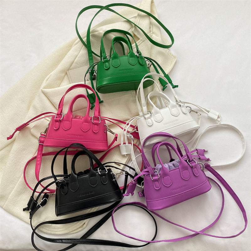 Mini Handtasche für Damen ⎜ Farbige Umhängetasche mit Tragegriff für Alltag, Party und stilvolle Outfits