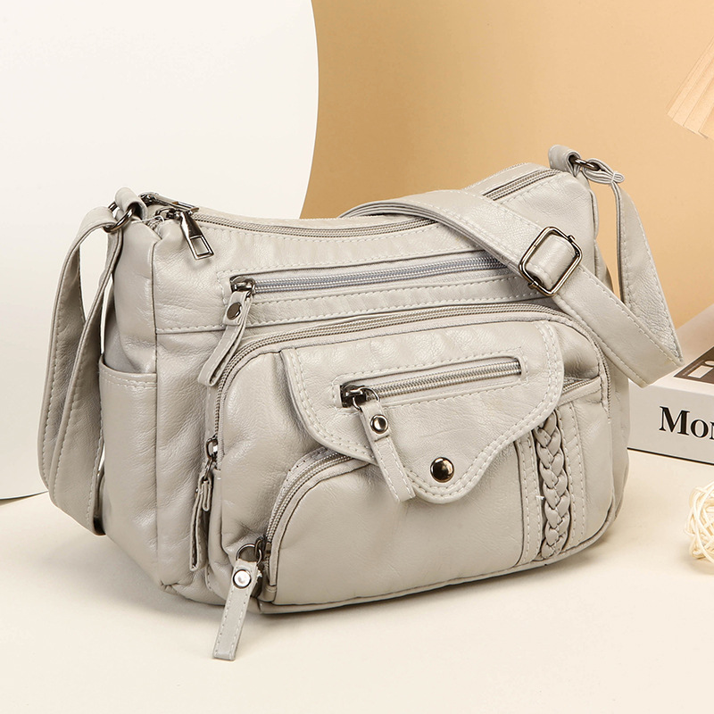 Schultertasche für Damen ⎜ Modische Umhängetasche aus weichem Kunstleder mit geflochtenem Detail und viel Stauraum