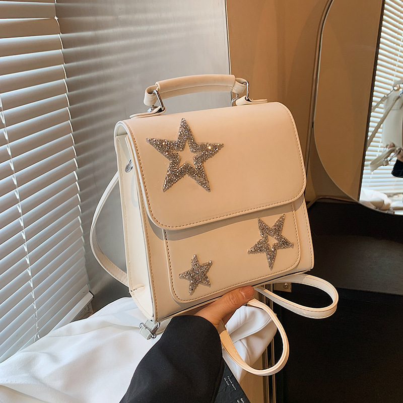 Damen Rucksack mit Pailletten-Sternen ⎜ Modischer Tagesrucksack mit Glitzerdetails und Tragegriff