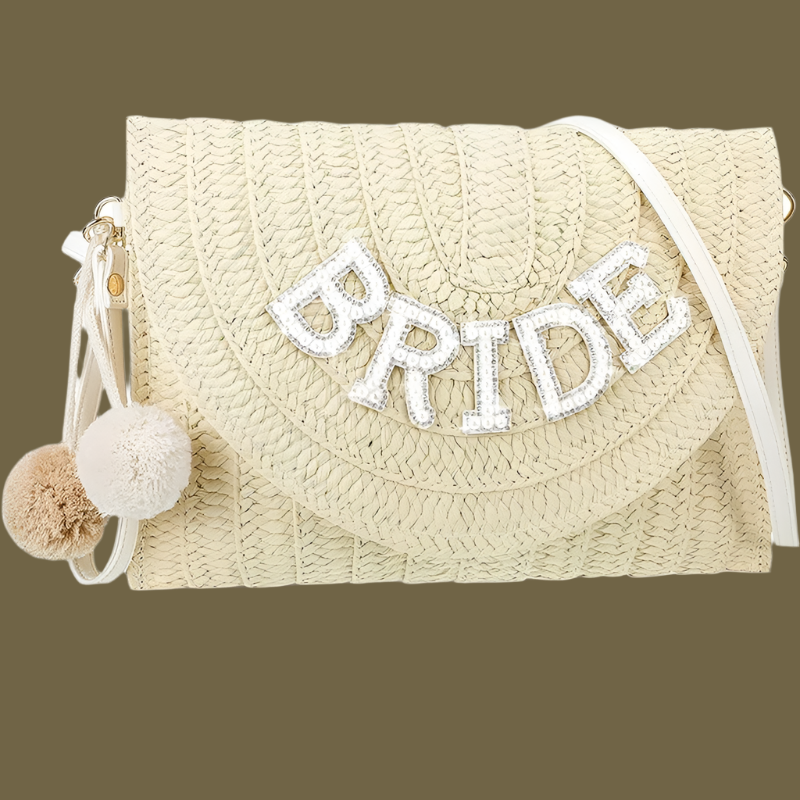 Umhängetasche aus Stroh für Damen ⎜ Stilvolle Clutch mit BRIDE-Schriftzug und Pompons für Junggesellinnenabschied