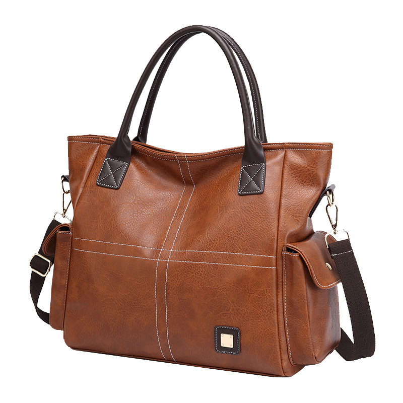 Handtasche für Damen ⎜ Geräumige Schultertasche in Lederoptik mit Seitenfächern und Tragegurt