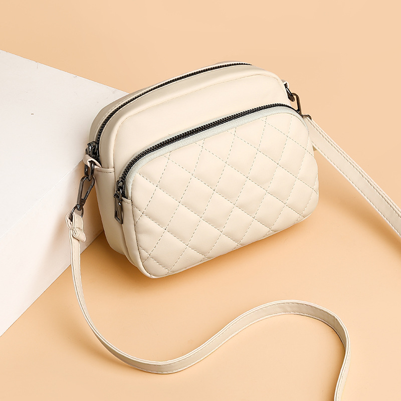 Damen Umhängetasche ⎜ Kompakte Schultertasche mit Steppmuster für Alltag und Freizeitoutfits