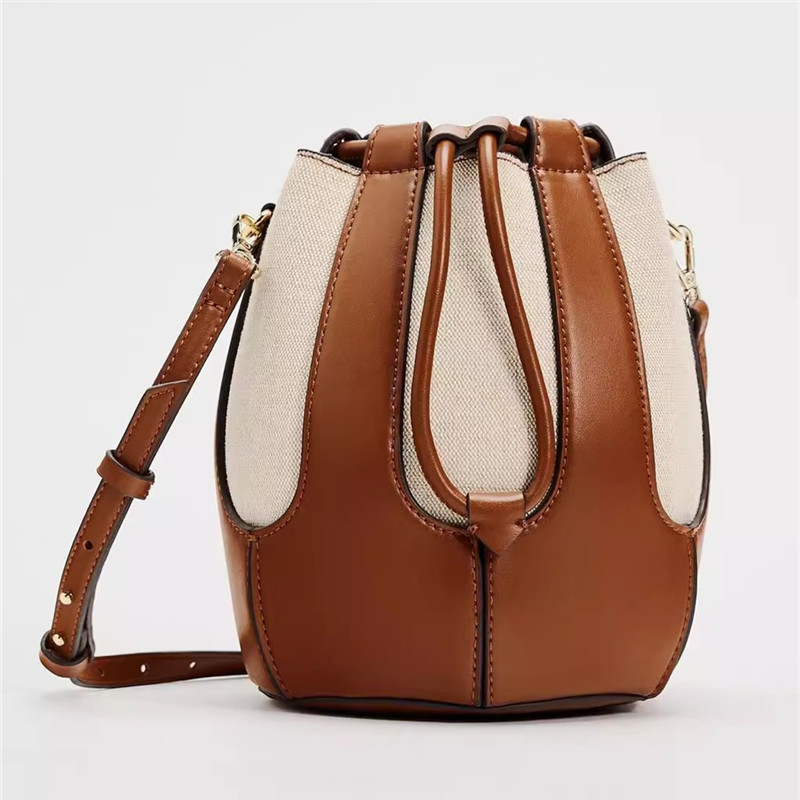 Damen Umhängetasche im Bucket-Stil ⎜ Modische Canvas-Tasche mit Kordelzug und verstellbarem Schulterriemen