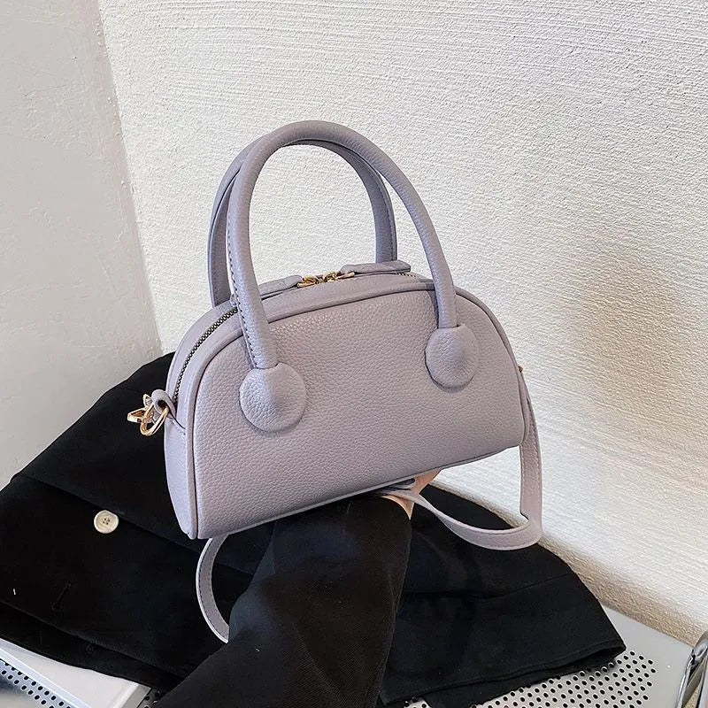 Handtasche für Damen ⎜ Kompakte Schultertasche im eleganten Design mit Reißverschluss für Alltag und Ausgehen