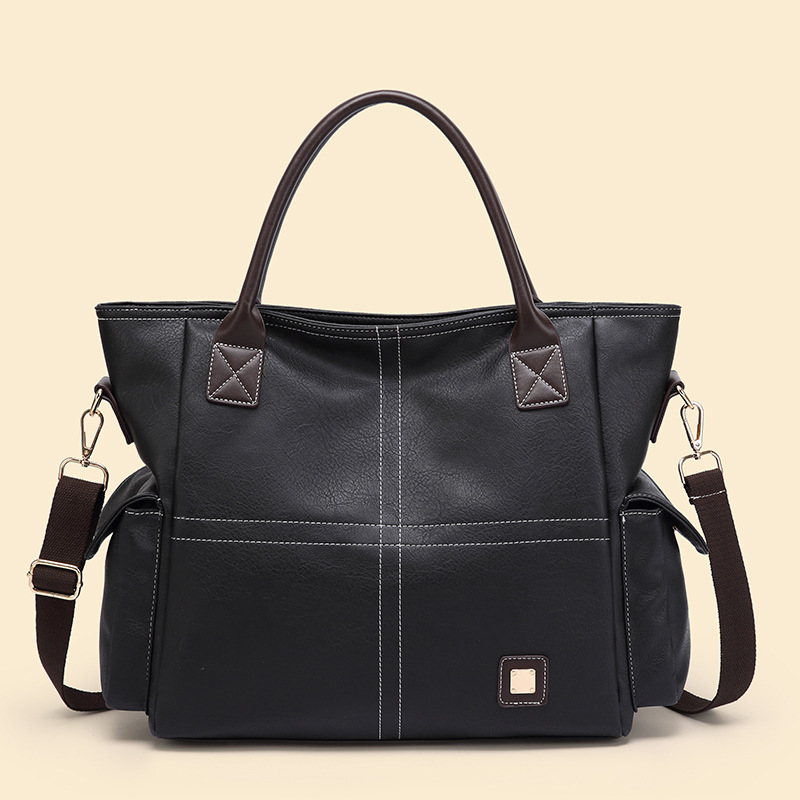 Handtasche für Damen ⎜ Geräumige Schultertasche in Lederoptik mit Seitenfächern und Tragegurt