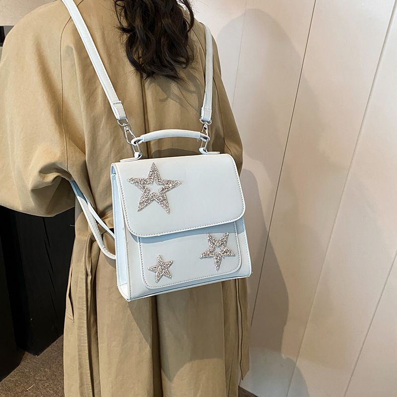 Damen Rucksack mit Pailletten-Sternen ⎜ Modischer Tagesrucksack mit Glitzerdetails und Tragegriff