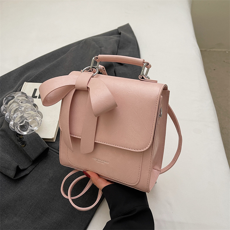 Moderne Umhängetasche für Damen ⎜ Elegante Tasche mit Schleifen-Design und praktischem Tragegriff