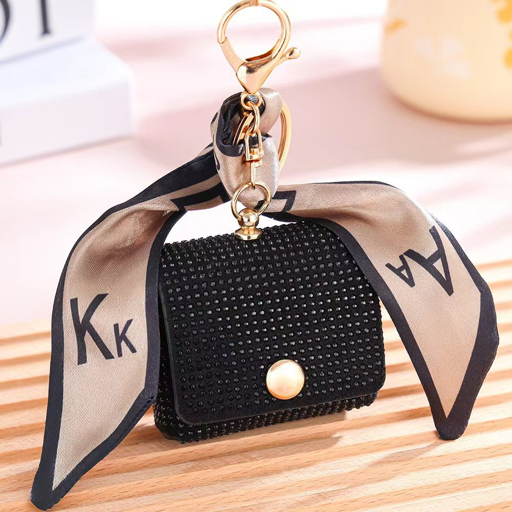 Damen Mini-Münzbörse mit Glitzersteinen ⎜ Stilvolle Tasche mit Schlüsselanhänger und dekorativem Band für unterwegs