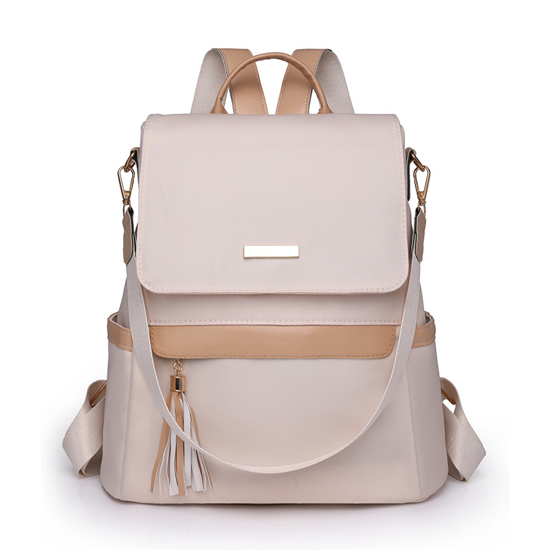 Damen Rucksack mit Quaste ⎜ Stylischer Tagesrucksack in Retro-Optik mit Fronttasche für Alltag und Freizeit