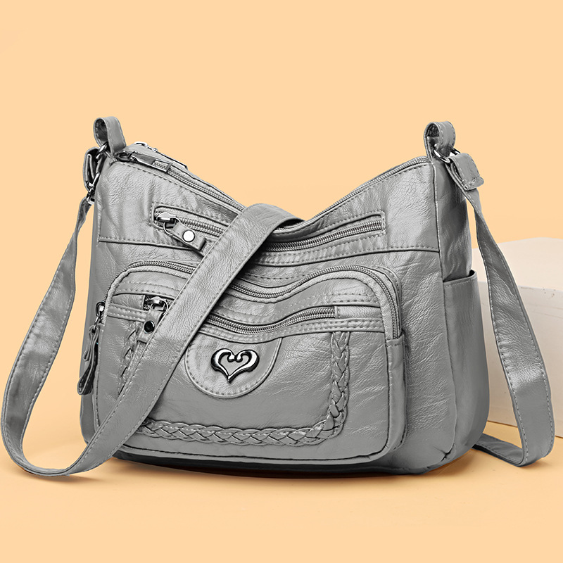 Schultertasche für Damen ⎜ Sommerliche Umhängetasche mit großem Stauraum und stilvollem Herzdetail vorne
