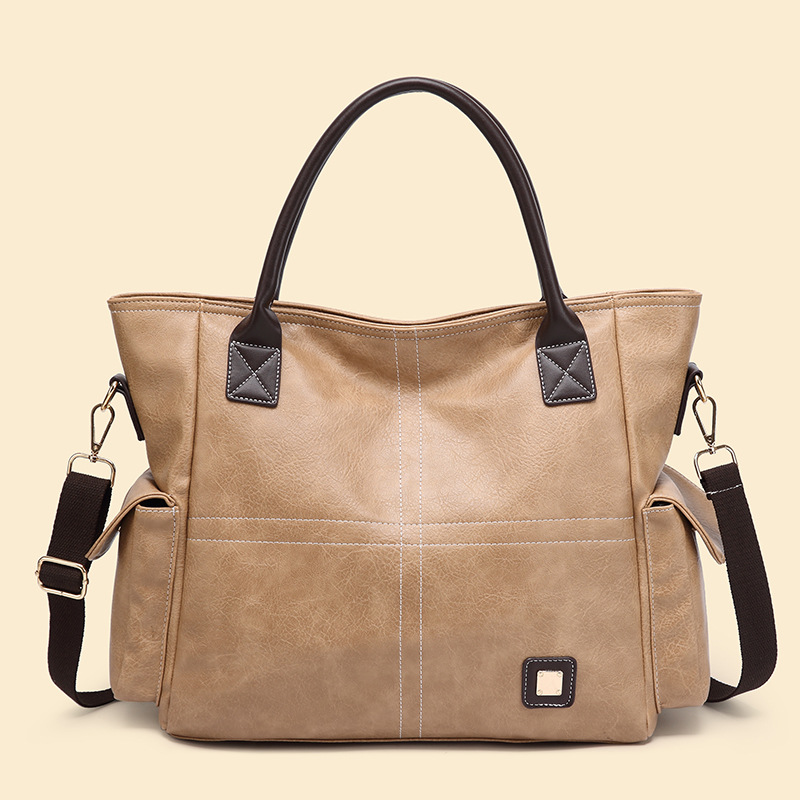 Handtasche für Damen ⎜ Geräumige Schultertasche in Lederoptik mit Seitenfächern und Tragegurt