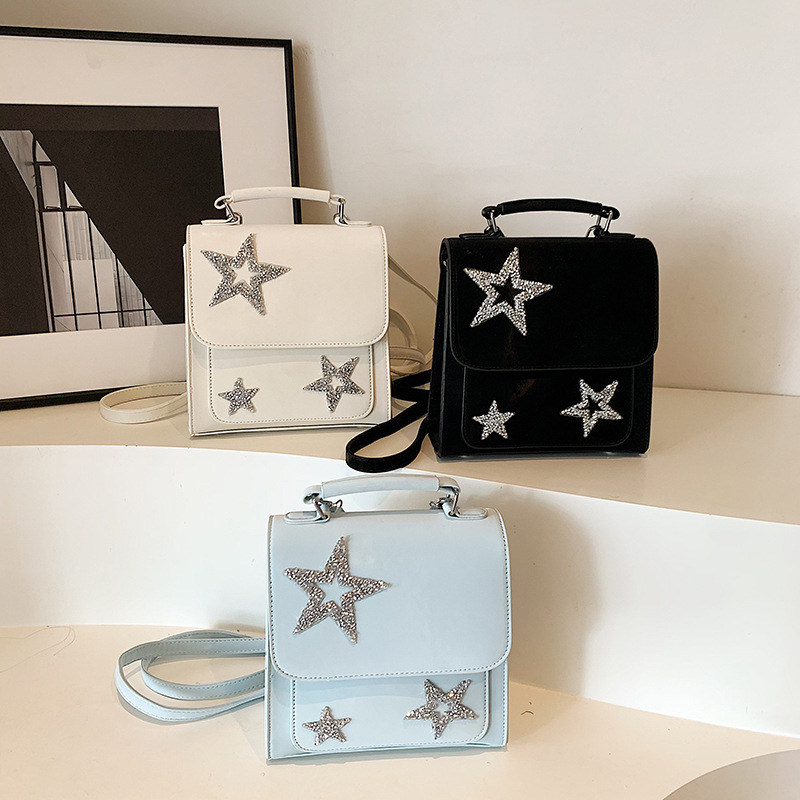 Damen Rucksack mit Pailletten-Sternen ⎜ Modischer Tagesrucksack mit Glitzerdetails und Tragegriff
