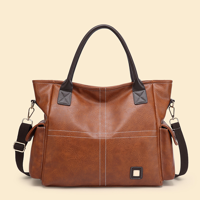 Handtasche für Damen ⎜ Geräumige Schultertasche in Lederoptik mit Seitenfächern und Tragegurt