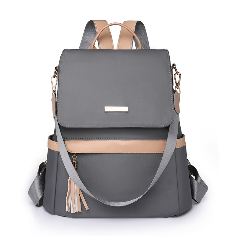 Damen Rucksack mit Quaste ⎜ Stylischer Tagesrucksack in Retro-Optik mit Fronttasche für Alltag und Freizeit