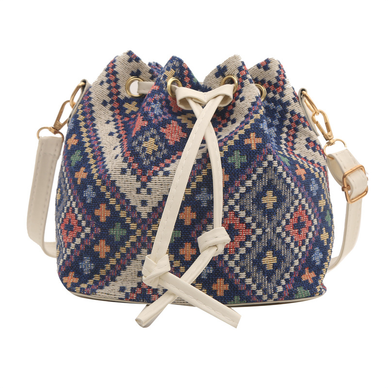 Umhängetasche im Retro-Stil ⎜ Praktische Beuteltasche mit trendigem Muster und verstellbarem Schultergurt
