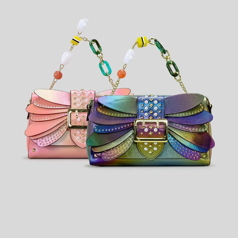 Handtasche für Damen ⎜ Auffällige Schultertasche mit Schmetterlingsflügel-Design und dekorativen Nieten für besondere Anlässe