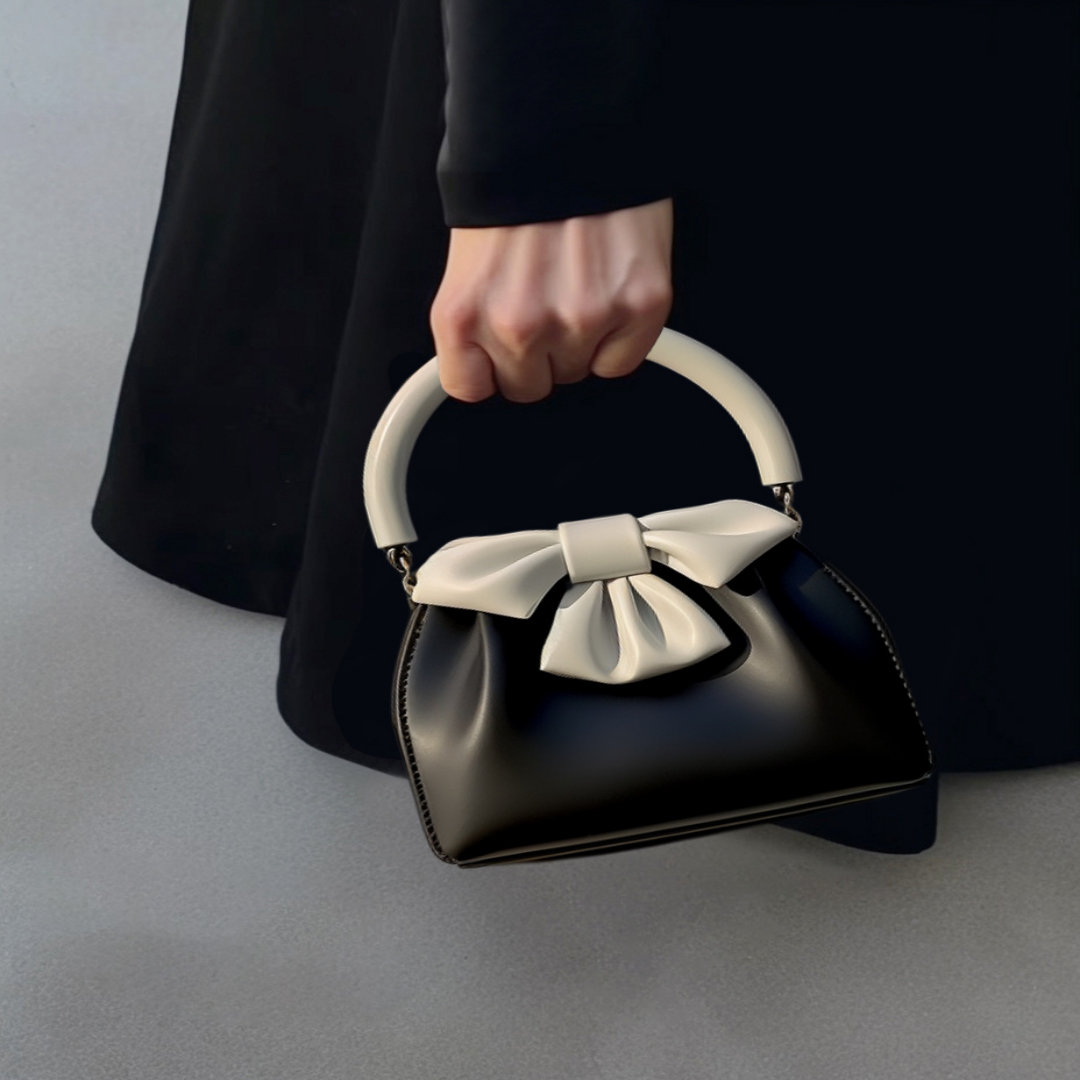 Damen Handtasche ⎜ Elegante Bucket Bag mit kontrastfarbenem Schleifendetail und gerafftem Design