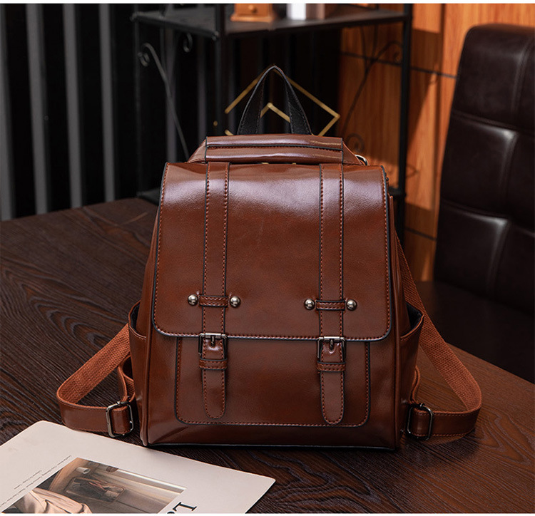Damen Rucksack aus Kunstleder ⎜ Vielseitiger Tagesrucksack mit Schnallendetail und Tragegriff für Reisen und Alltag