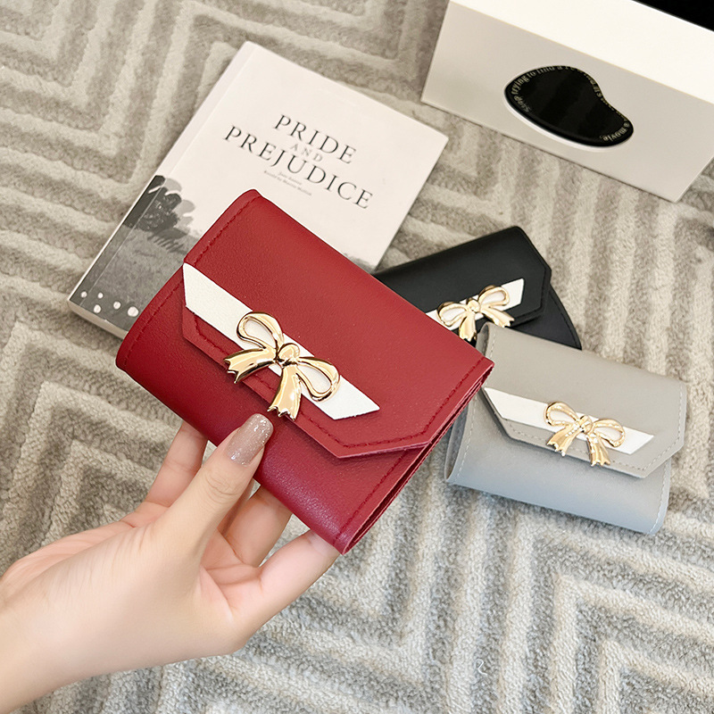 Damen Geldbörse mit Schleife ⎜ Kompakte dreifach faltbare Brieftasche mit Druckknopf und elegantem Design
