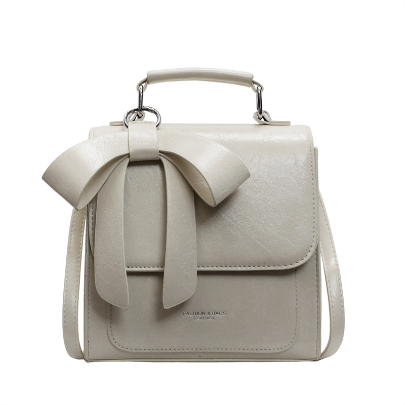 Moderne Umhängetasche für Damen ⎜ Elegante Tasche mit Schleifen-Design und praktischem Tragegriff